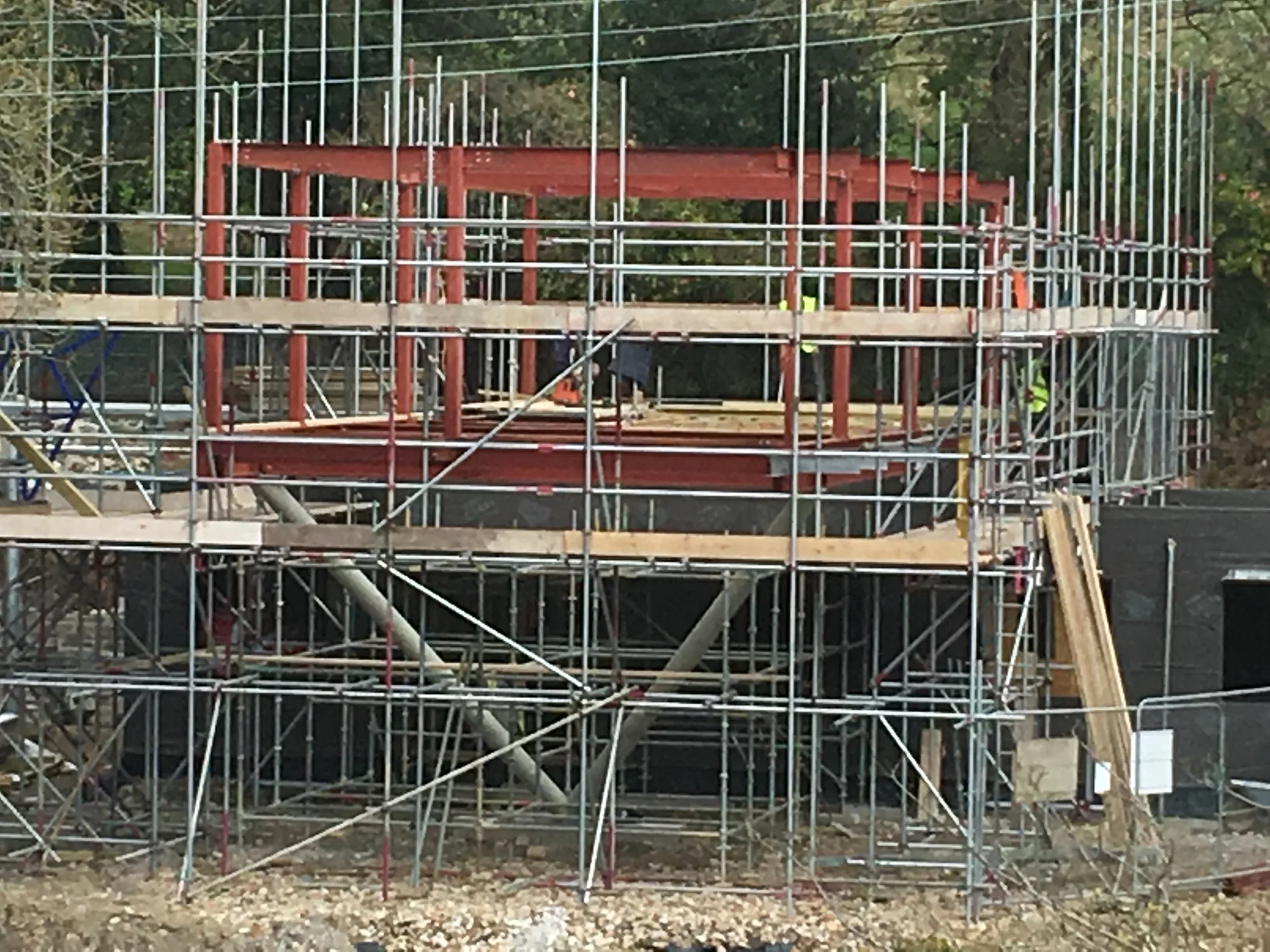 Structural frame and extensive scaffolding during the construction of Sylvania in Feock, Cornwall